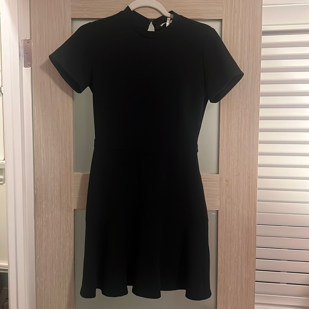 Perfectly fitted flare bottom black dress